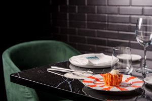 Foto de mesa y servicio en Gianna Ristorante